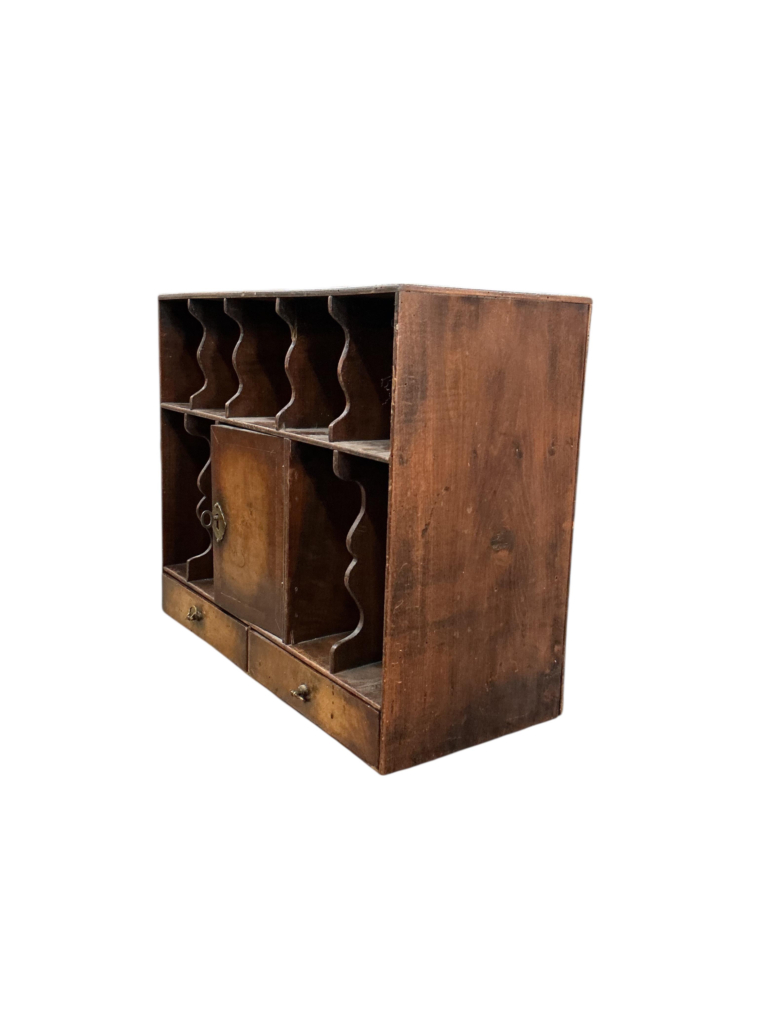 A Queen Anne Revival walnut pigeonhole unit, width 43cm, depth 19cm, height 36cm